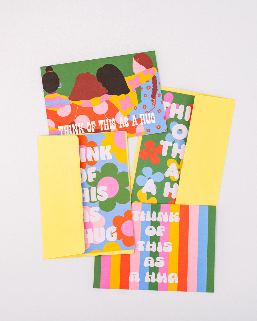 set of 20 greeting cards with 4 styles of 'think of this as a hug' with pale yellow envelopes