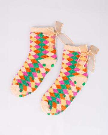 colorful checkerboard chenille grip socks with bow detail