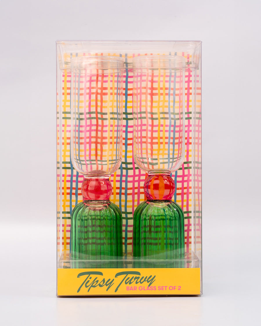 packaged set of 2 bar glasses with green base and pink center detail