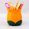 yellow tulip pencil cup with desk accessories inside