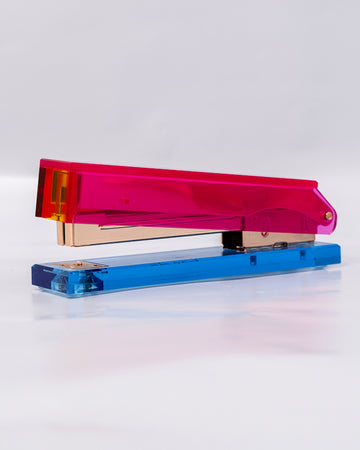 pink, red and blue acrylic stapler