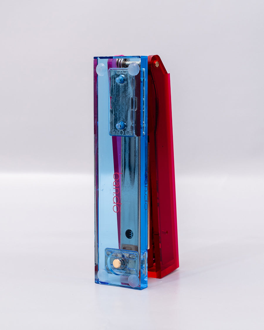 pink, red and blue acrylic stapler set upwards