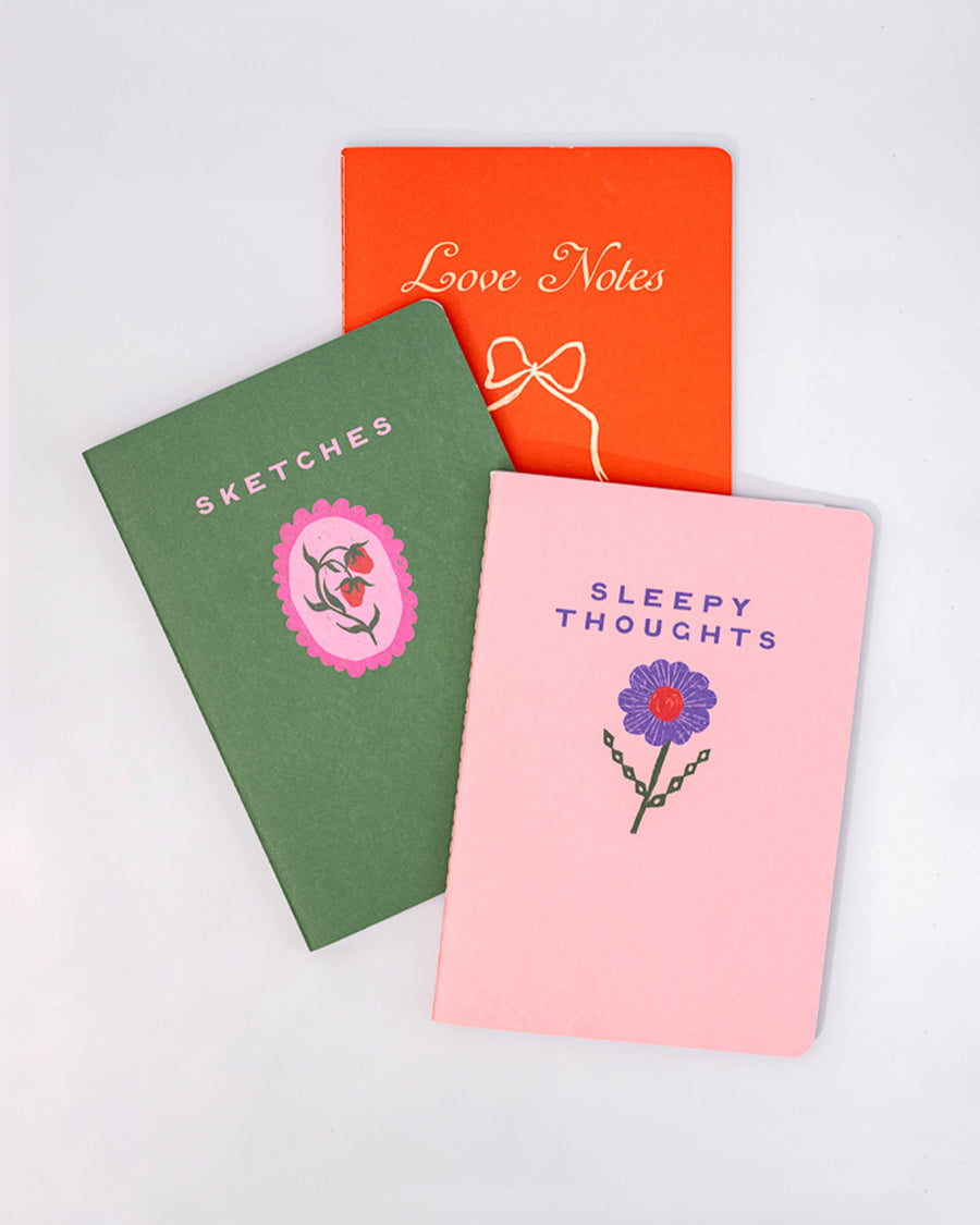 set of three purse size notebooks: pink sleepy thoughts, green sketches and red love notes