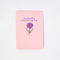 pink notebook with purple 'sleepy thoughts' and flower graphic