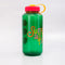 side view of green nalgene like bottle with pink lid, yellow strap and colorful 'sunshine all the time' across the front