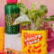 green nalgene like bottle with pink lid, yellow strap and colorful 'sunshine all the time' across the front surrounded by colorful ban.do items