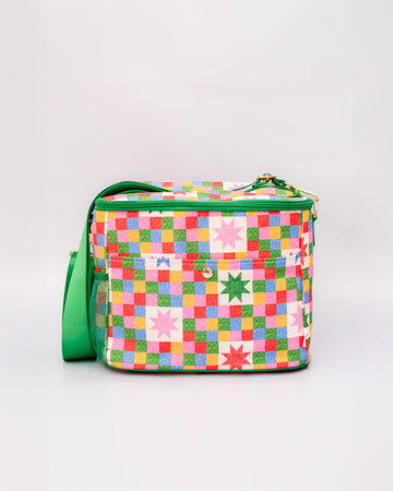 colorful 'quilted' star lunch bag with green trim and strap and front pocket