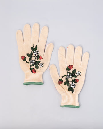 cream gardening gloves with white flower and strawberry print and green trim