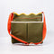 army green canvas gardening tool bag with red strap and yellow scalloped top edge