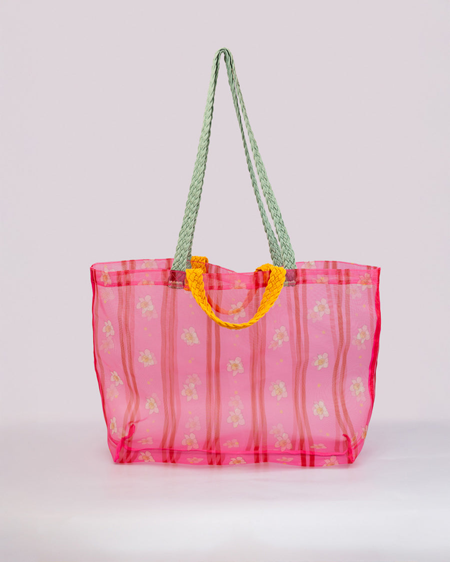 sheer hot pink with floral print and vertical stripes and red and yellow braided straps