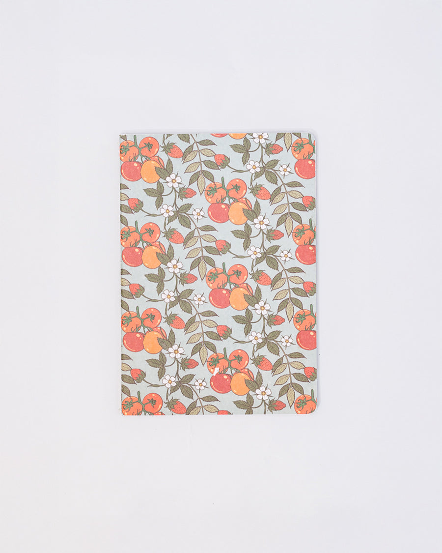 light blue notebook with tomato and strawberry print