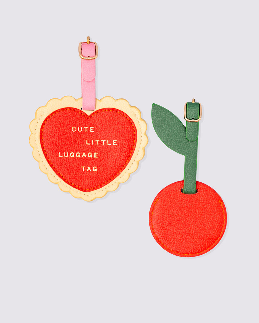 set of 2 leatherette luggage tags with red heart that says 'cute little luggage tag' and tag shaped as a cherry