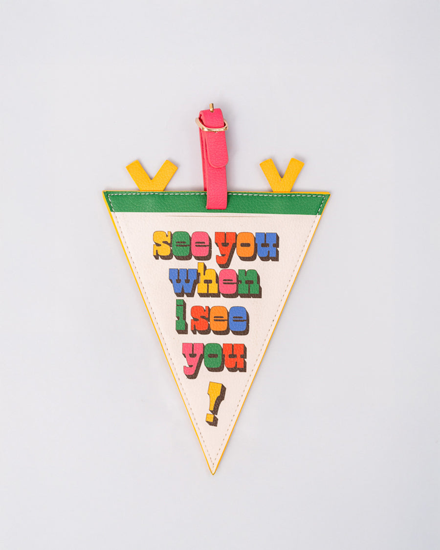 cream pennant luggage tag with colorful 'see you when i see you!' front and pink, yellow and green trim