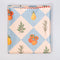 front of double sided picnic blanket with elastic and cream and blue diamond fruit print