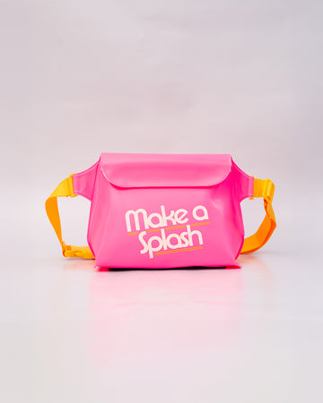 pink rubber waterproof bag with white 'make a splash' with yellow strap