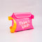 side view of pink rubber waterproof bag with white 'make a splash' with yellow strap