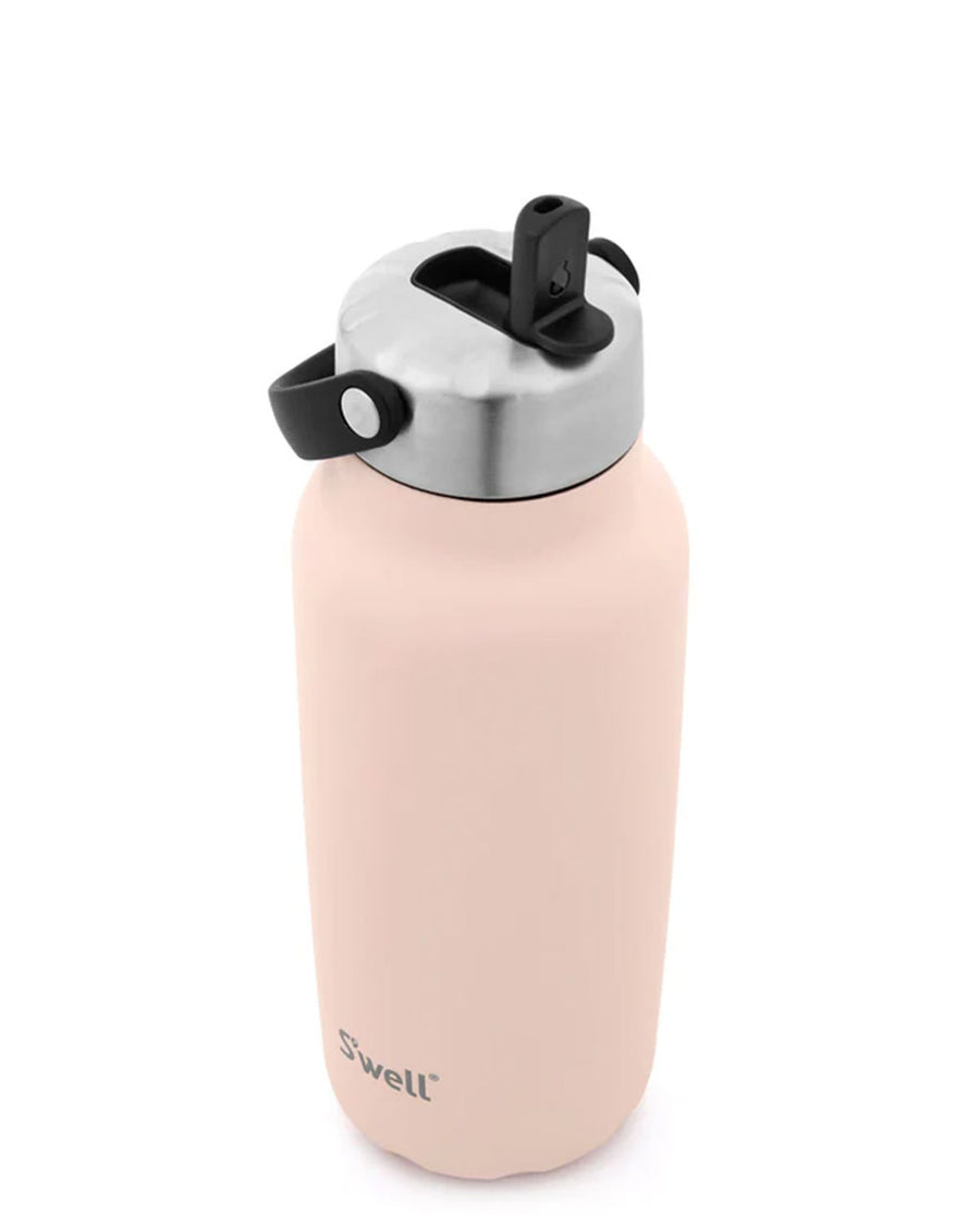 side view of light pink stainless steel water bottle with flip sip lid