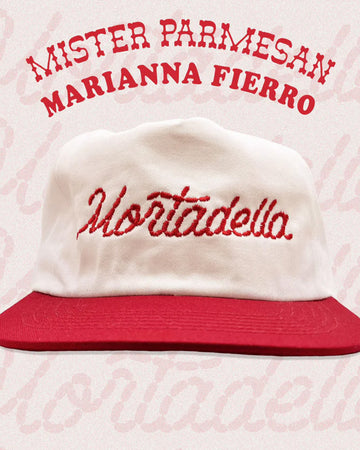 cream and red snapback hat with embroidered 'mortadella' across the front