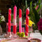 set of 4 scented taper candles with various pink, white and red designs