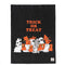 reverse side of black pillowcase style trick or treat bag that has all the peanut characters in costume and says 'TRICK OR TREAT'