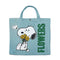 light denim cotton tote with snoopy holding yellow flowers and green 'flowers' on the side