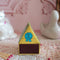 back striker of colorful dog house shaped match box with pink tipped matches