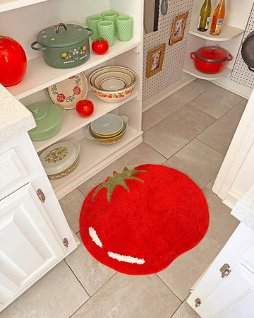 large red beefsteak tomato throw rug in a pantry