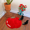 large red beefsteak tomato throw rug in a hallway