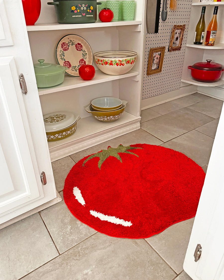 large red beefsteak tomato throw rug in a pantry