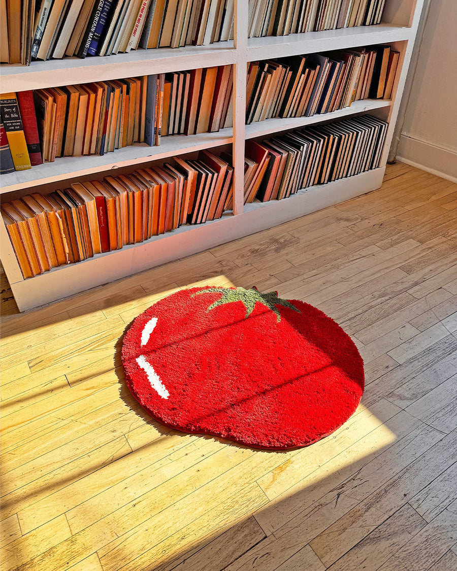 large red beefsteak tomato throw rug in the sunlight