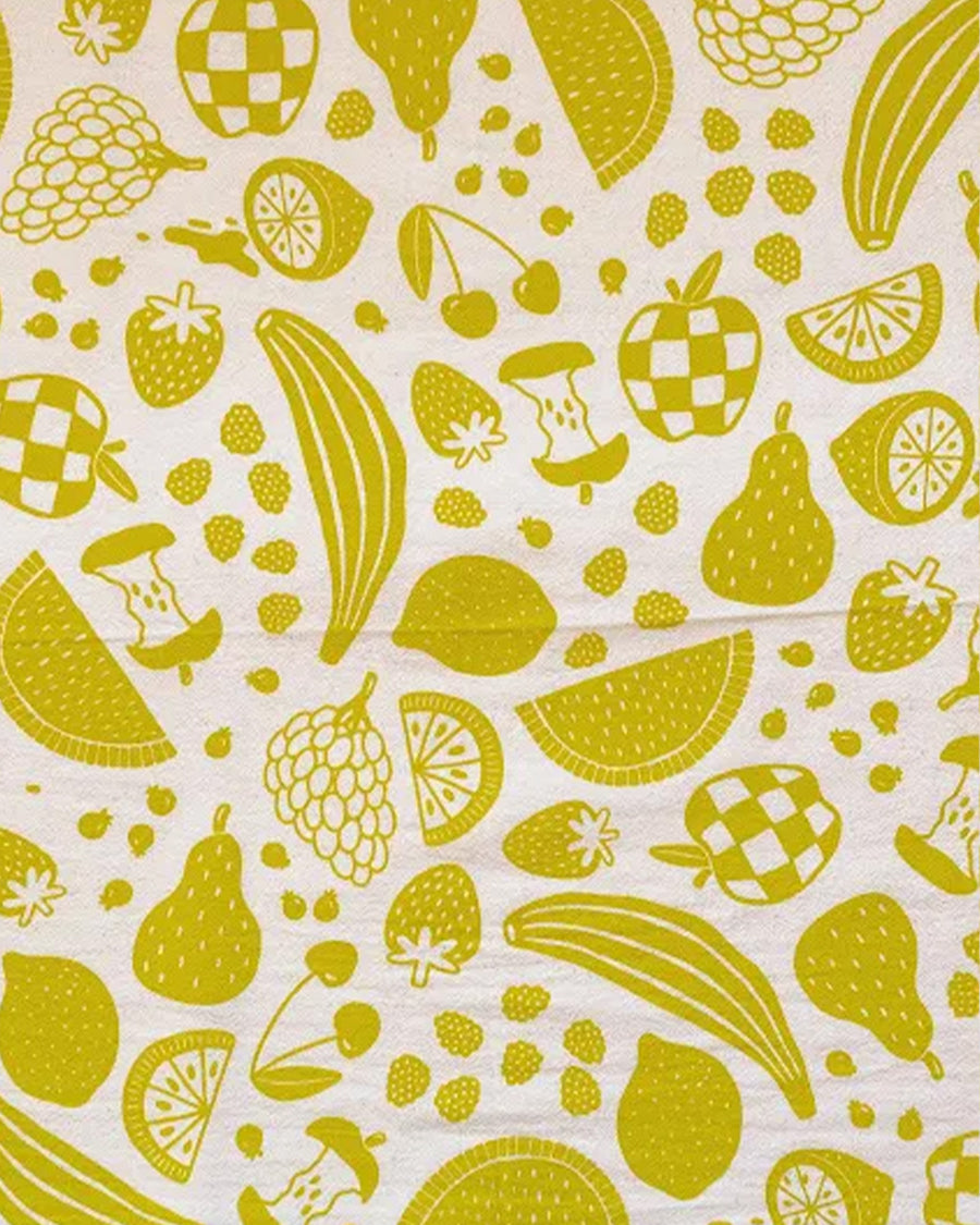 up close of mustard yellow fruit print tea towel