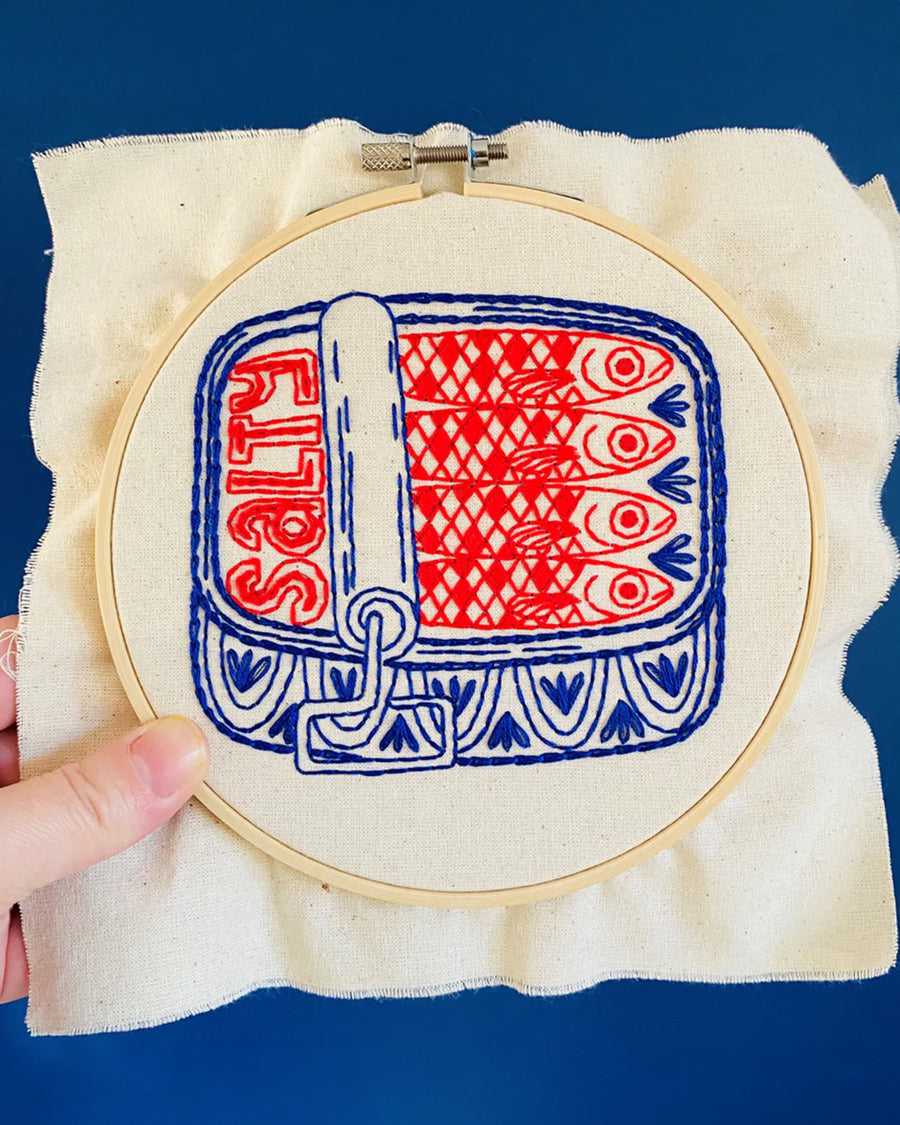 unfinished red and blue tin sardine embroidery kit