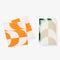 stack of 4 trippy checker napkins: orange, tan, black and green