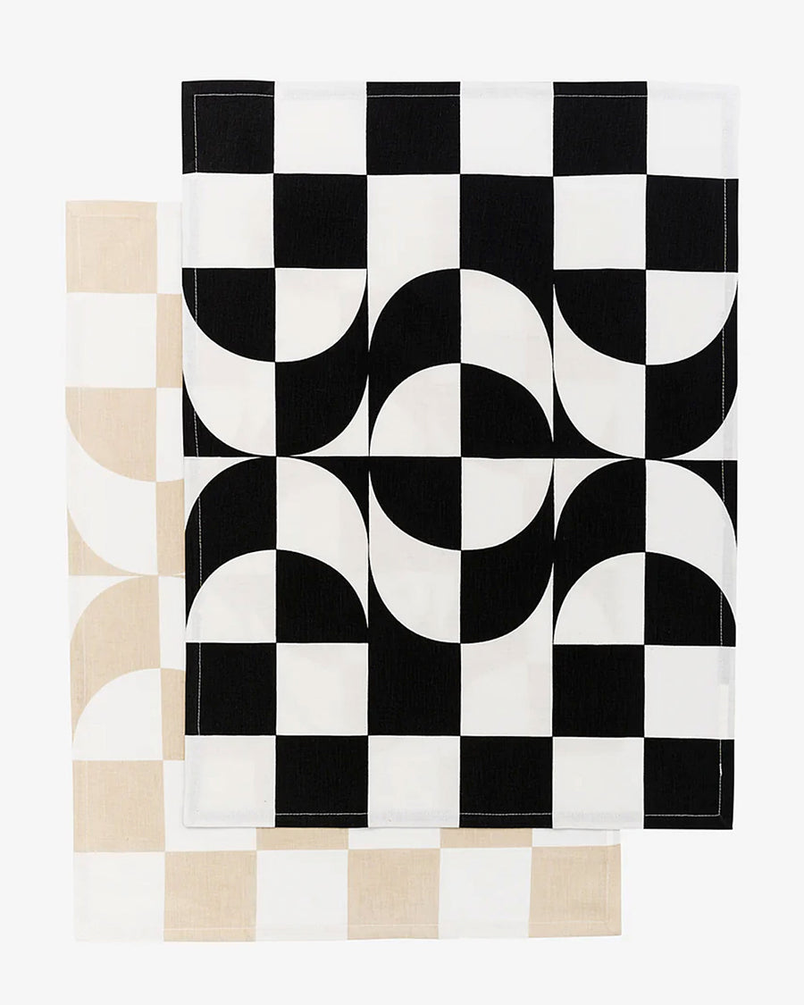 unfolded set of two trippy checkered hand towels: tan and white and black and white