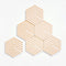 separated set of six cork and white optical coaster set