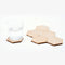 set of six cork and white optical coaster set with a cup on it