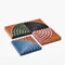 set of 4 terracotta coasters with colorful ribbed detail