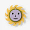 spinning yellow sun wall clock with face