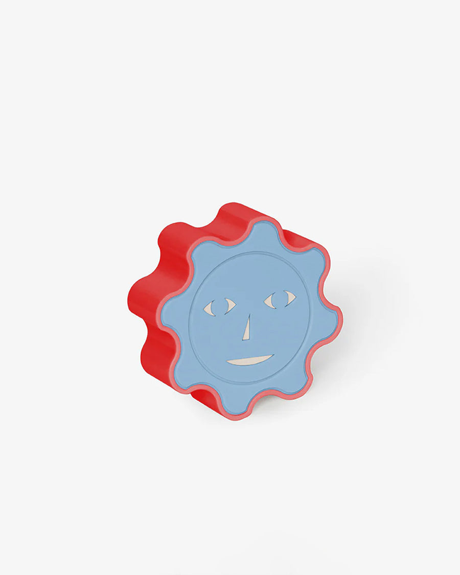 blue and red sun face night light