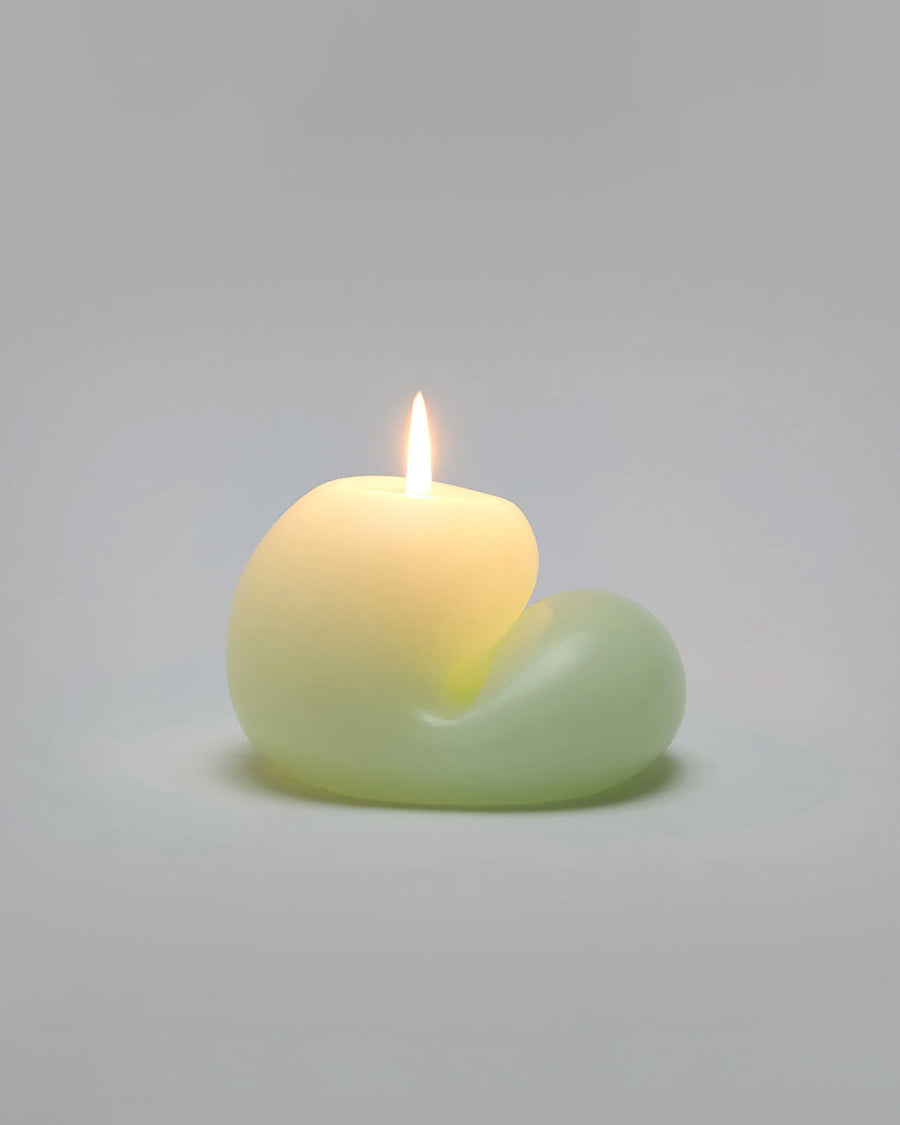 lit light green blob unscented candle