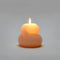 lit light peach blob unscented candle