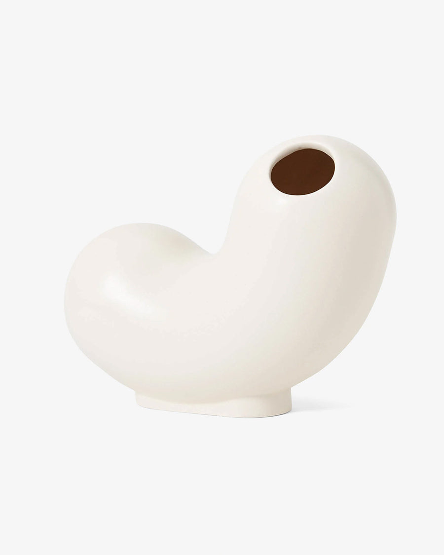 white ceramic curly vase