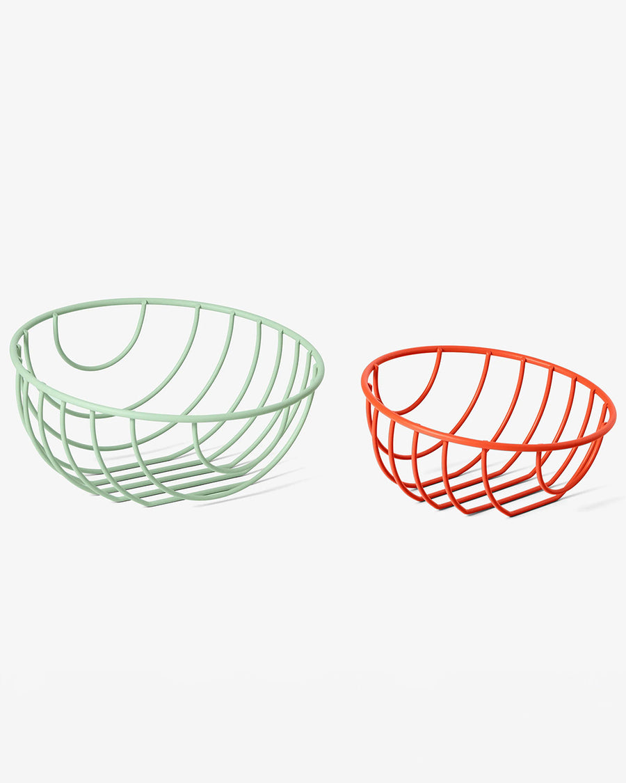 separated set of two wire baskets: green large and small red