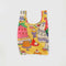 yellow baby baggu with colorful abstract cake and pastry print