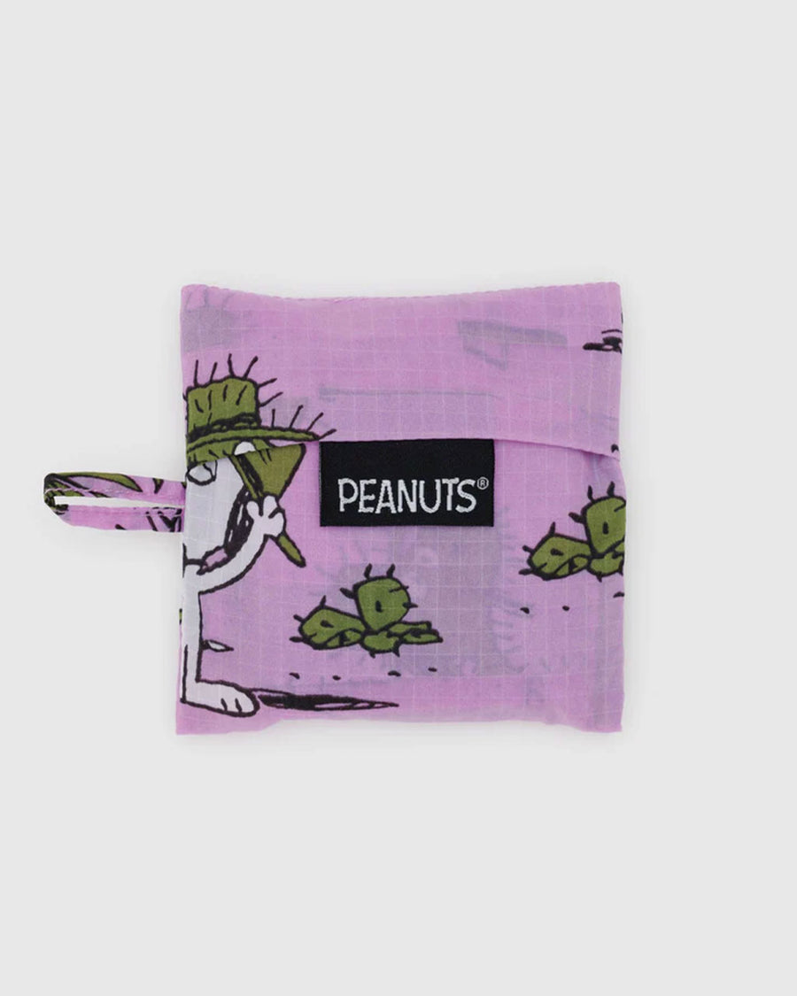 packaged purple baby baggu with peanuts spike and cactus print