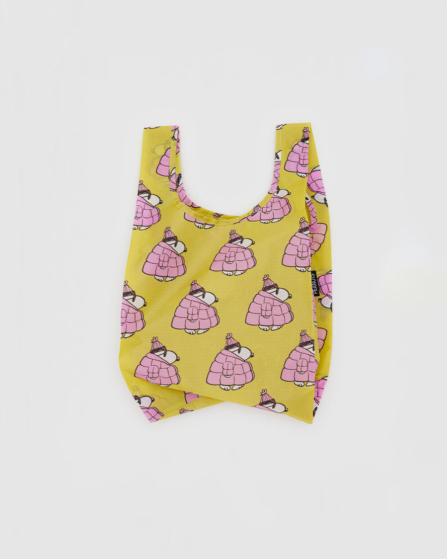 yellow small baggu with snoopy in a bubblegum pink puffer coat and hat