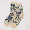 cream crew socks with navy cherub and bow print