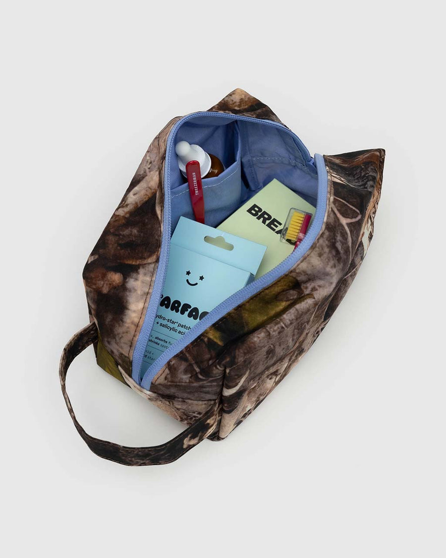 cornflower interior of realistic branch and leaves dopp kit with cornflower accent zipper