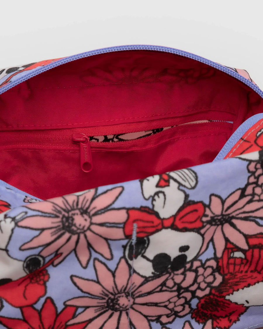 zipper interior of lavender dopp kit with snoopy and floral print