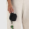 model holding black mini baggu fanny pack keychain